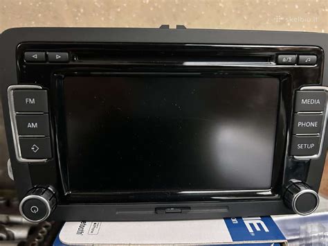 Volkswagen RCD 310 magnetola su įvedamo kodo ekranu