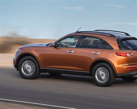 The Infiniti FX35 Kuro model in brown-orange metallic with an orange leather interior
