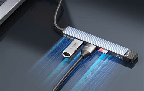 Nuotrauka: USB DAC adapteris, prijungtas prie nešiojamojo kompiuterio