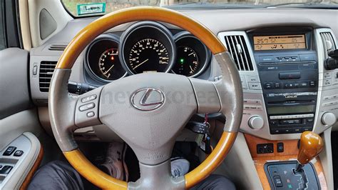 Lexus RX 330 žibintų aukščio reguliavimo daviklio schema