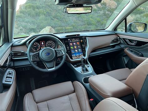 Interior photo of the Subaru Outback showing the infotainment screen and dashboard