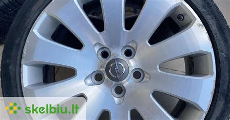 Nuotrauka: pilkos poliruotos (grey polished) Opel Insignia ratlankių rinkinys.