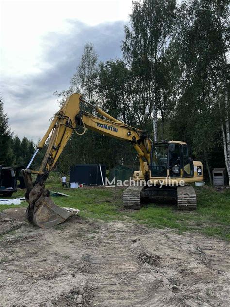 Komatsu vikšrinio ekskavatoriaus darbo schemos infografika