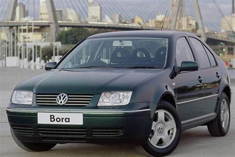 The Volkswagen Bora (1J2) sedan from the late 1990s, showcasing its compact city car design.