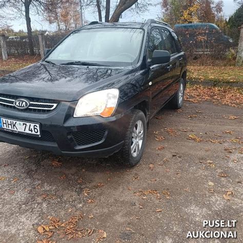 nuotrauka: Kia Sportage važiuojantis keliu