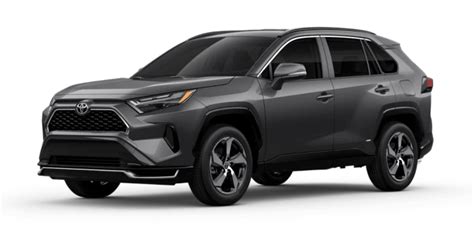 Toyota RAV4 Plug-in Hybrid važiuoja kelio posūkyje