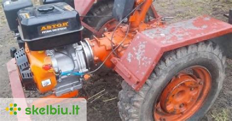 MTZ-05 motoblokas su priekaba, vežantis įvairius krovinius
