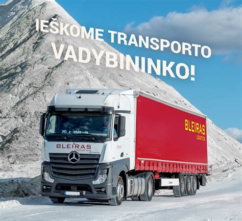 Teminė nuotrauka su vilkikais kelyje ir vairuotojais