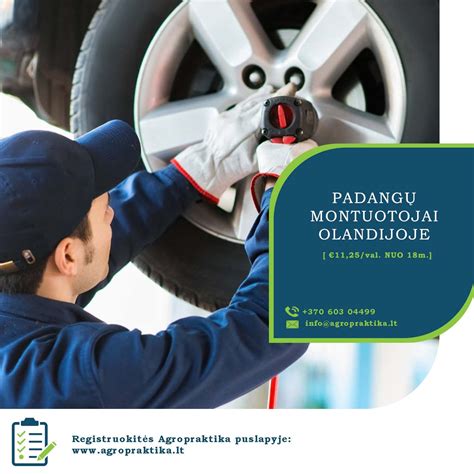 Automobilių serviso darbuotojai montuojantys padangas
