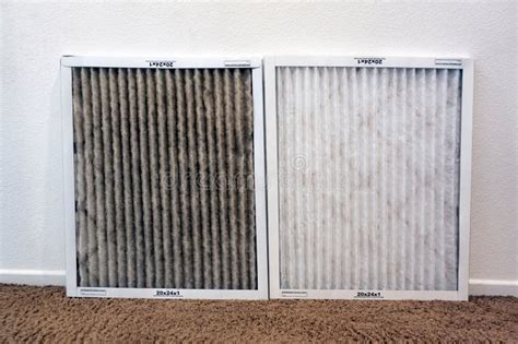 Photo showing a dirty old air filter next to a clean new air filter, for comparison