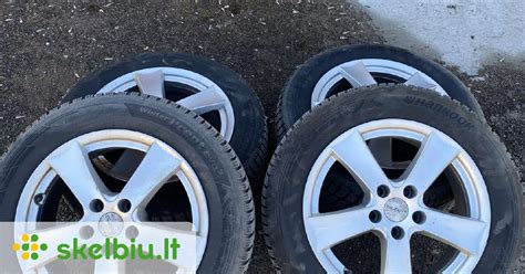 automobilio Peugeot 206 su lietų ratlankiais nuotrauka
