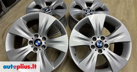BMW E34 su skirtingų dydžių ratlankiais