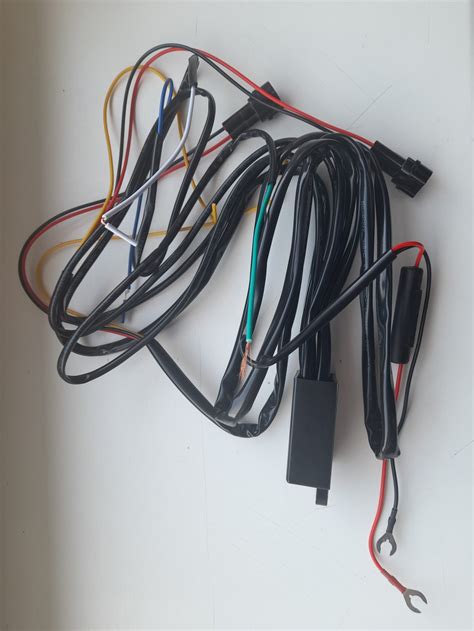 DRL žibintų montavimo schema su matmenimis